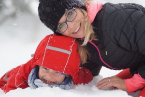 Mother and child in snow