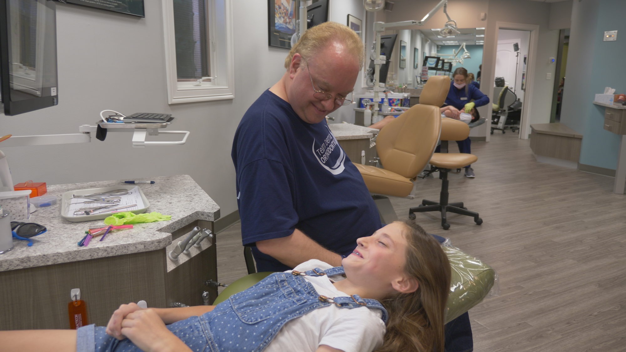 Dr. Demas with a patient