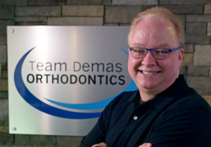 dr. demas headshot southington orthodontist